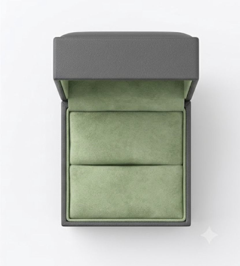 SeeBox ring box open, pistachio suede interior